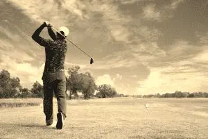 Golfer Swinging Driver